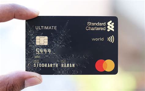 standard chartered india credit card charges